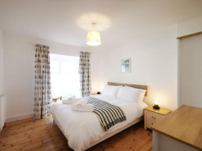 No 28 Contemporary beach side property with sea views